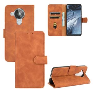 For Nokia 7.3 Solid Color Skin Feel Magnetic Buckle Horizontal Flip Calf Texture PU Leather Case with Holder & Card Slots & Wallet(Brown) (OEM)