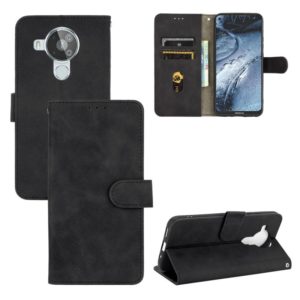 For Nokia 7.3 Solid Color Skin Feel Magnetic Buckle Horizontal Flip Calf Texture PU Leather Case with Holder & Card Slots & Wallet(Black) (OEM)