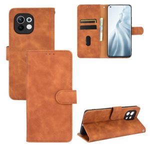 For Xiaomi Mi 11 Solid Color Skin Feel Magnetic Buckle Horizontal Flip Calf Texture PU Leather Case with Holder & Card Slots & Wallet(Brown) (OEM)