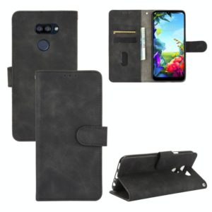 For LG K40S Solid Color Skin Feel Magnetic Buckle Horizontal Flip Calf Texture PU Leather Case with Holder & Card Slots & Wallet(Black) (OEM)