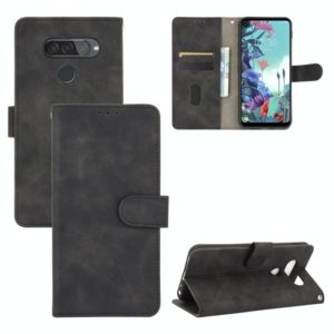 For LG Q70 Solid Color Skin Feel Magnetic Buckle Horizontal Flip Calf Texture PU Leather Case with Holder & Card Slots & Wallet(Black) (OEM)